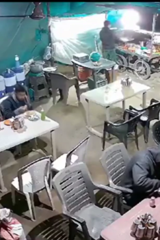 Men Eating Chicken know Something Isn't Right