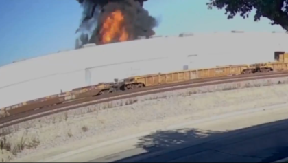 Plane crashes into warehouse in California