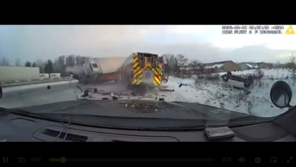 Truck smashes into emergency vehicles