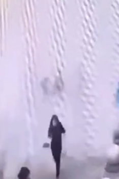 Rooftop Pool Water Explodes Onto Streets of People After EarthQuake