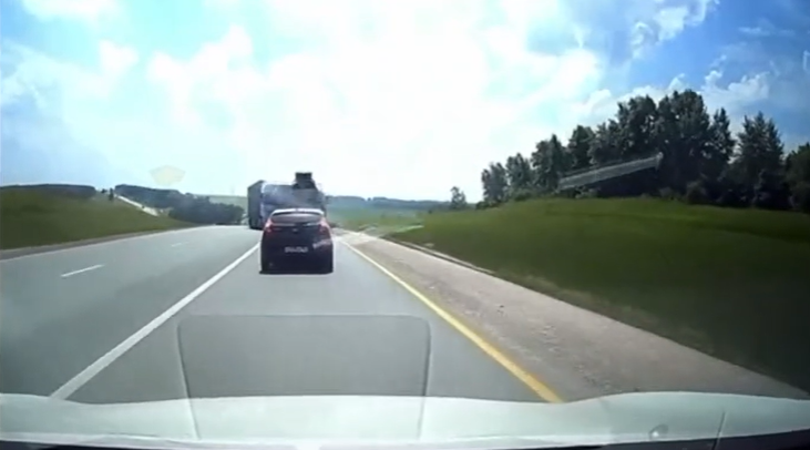 Big Rig Driver crosses Yellow Line into a Cement Truck